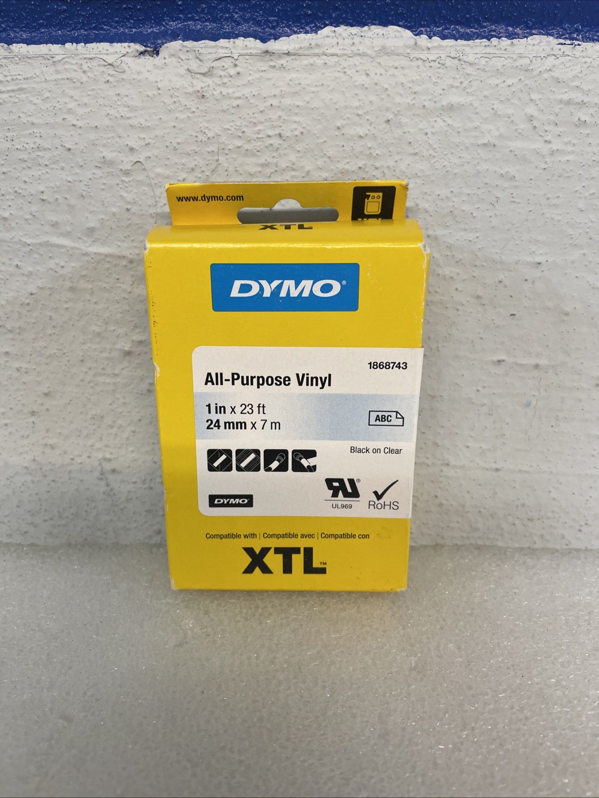 Dymo 1868743 XTL 24mm x 7m All-Purpose Vinyl Black on Clear New